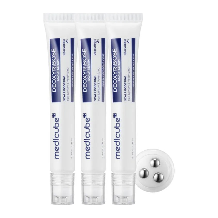 Three Lumeva scalp serum tubes with steel roller head